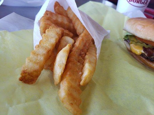 Golden crinkle cut fries.