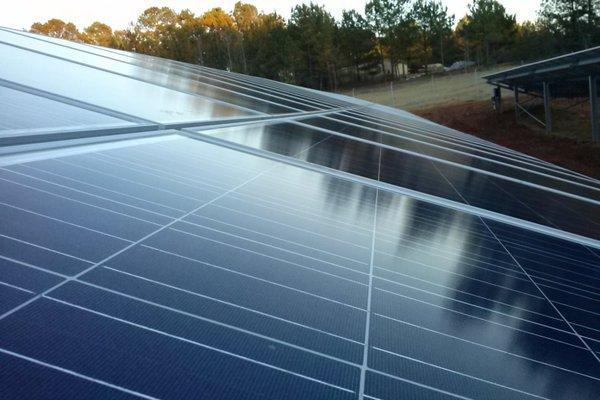 Close up down a row of solar panels