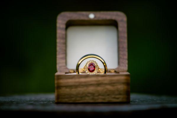 Wedding Rings, symmetrical, in wooden box.