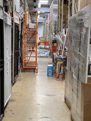 Junk in the shopping aisles and an unattended forklift.  Shop elsewhere.