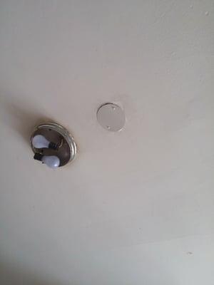 Kitchen light and hole where it used to be. They didn't get us a new light that actually had a cover so we have exposed wires