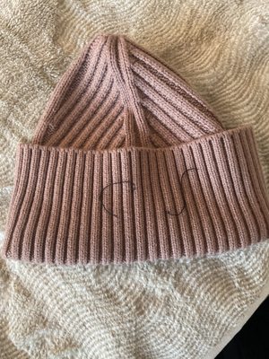 Stitched label ripped off the beanie