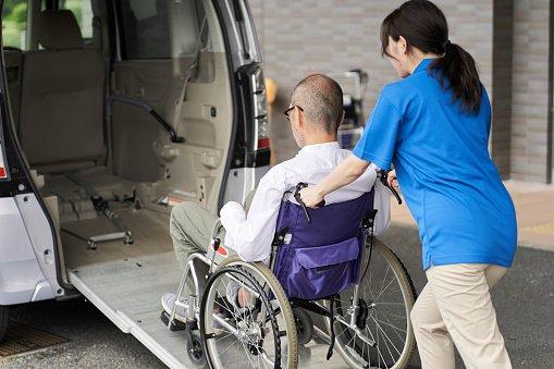 Jax Nemt helping wheel chair patients.