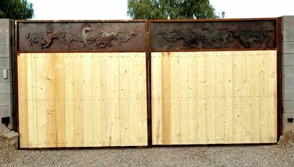 Custom horse dual swing gates w/ Liftmaster dual swing gate operators. As the cedar planks age these gates will only look more amazing.