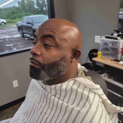 Men head shave with faded beard line up