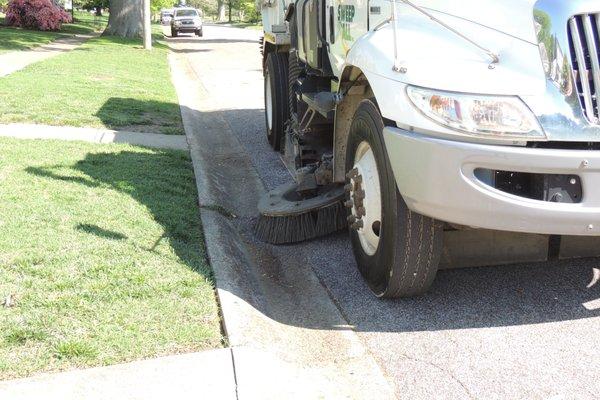 Roadway sweeping and power vacuum cleaning.