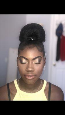 a soft smokey eye with a nude lip.