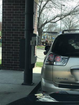 You communicate with the pharmacist through a video screen on the drivers side.