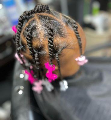 Kid style twists bows and ponytails