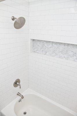 Loved out shower and the recessed shelf. One of my fav features