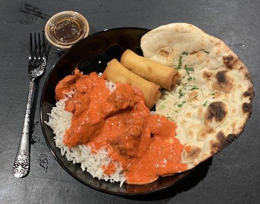 Butter Lamb, Basmati Rice, Spring Rolls with dipping sauce and Garlic Naan (bread).