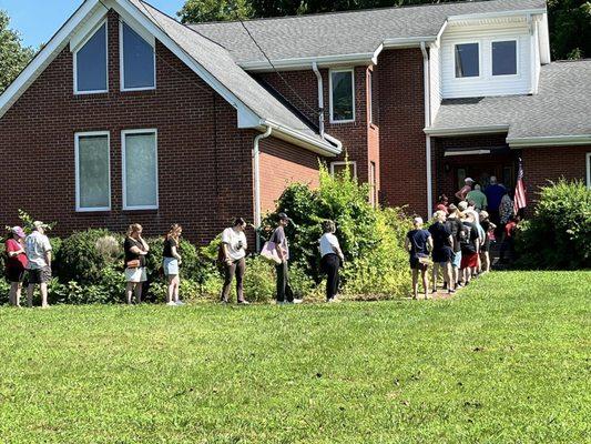 A line wrapped around the house of an Estate Sale we were having.