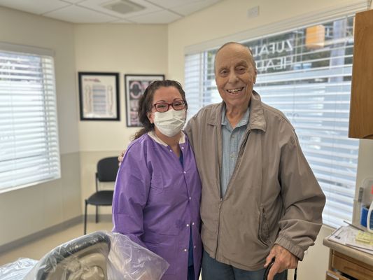 Antonella Maietta, DMD, and a military veteran patient pose at Zufall's 2022 "Smiles For Our Heroes" event.