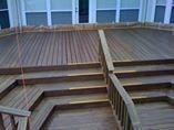 We just finished this Deck - notice the paper behind it to make sure everything kept clean. Another happy customer!!