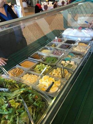 Our portable fresh salad bar can hold up to 32 items for your event!