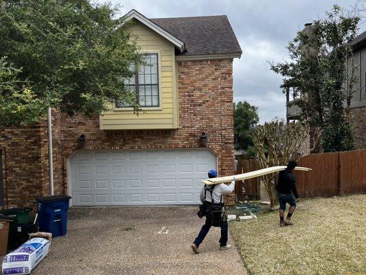 Full siding replacement customer choose James Hardie primed hardie plank