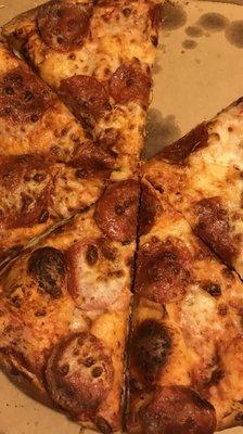 Burned crust I went and looked at Dominos website and I did not see any of the pictures of the pizza on the website look like this