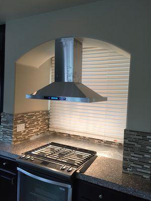 A new range hood installed.