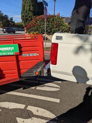 Trailer wedged under truck