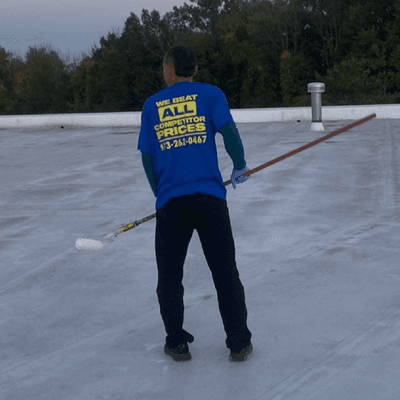 Teamwork makes the dream work! Our team waterproofed this beautiful flat roof, keeping it protected for years to come.