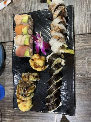 Yellow Brick Roll, Rainbow Roll, Shrimp Tempura Roll, and BBQ Beef Roll