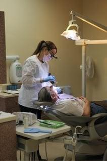 Kristin cleaning our patient, Steve's teeth.