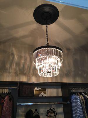 Make your new closet pop with a chandelier