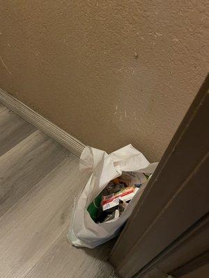 Trash left outside the trash chute