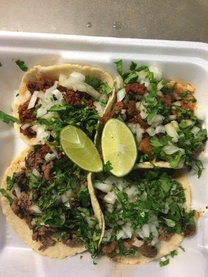 Tacos: chorizo, pastor, tripa, and lengua.