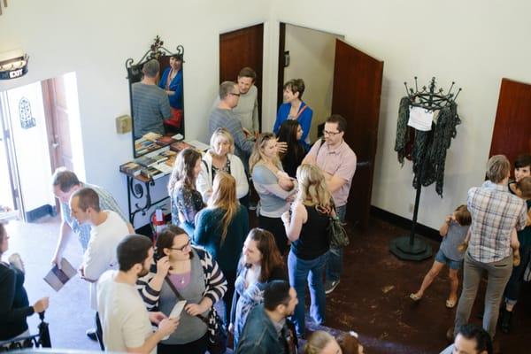 Church community in the foyer before the service