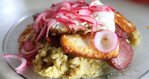 Dominican Breakfast Mangu with eggs, fried cheese, and fried salami