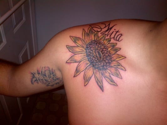 Boyfriends 'r' and sunflower done by shop owner bobby