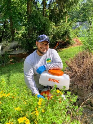 Our handsome spray tech (also my son)!