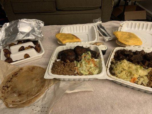 Fried Plantains, Beef Patty, Jerk Chicken, Oxtail, Rice and Peas