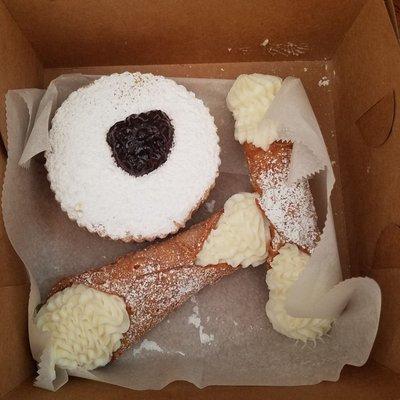 Cannolis and linzer cookie