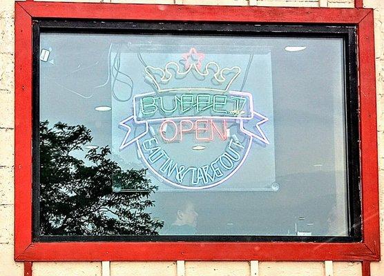 Super China buffet neon window sign.