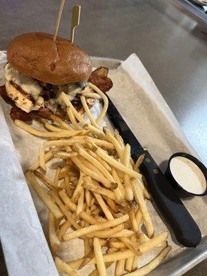 Grilled chicken sandwich on a gluten-free bun with shoestring french fries