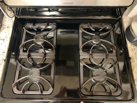 Customer's gas range after grease and grime removal.