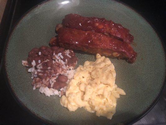 I'd didn't get a pic of everything but here's a couple of ribs, rice and Mac n cheese.  YUM!