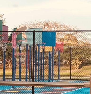 Basketball nets of all different heights for kids