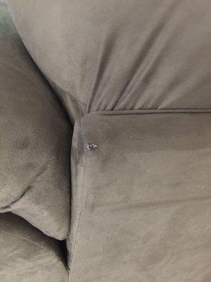 Pictures of the tear on my sofa after a few days from delivery