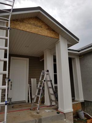 Siding and colum pillars also soffit porch lid