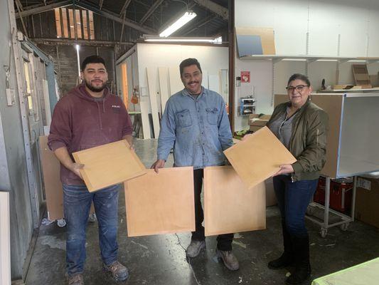 Owners Rogilio, Carla and Jr. with my refinished table tops!