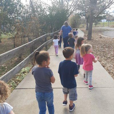 A Nature Walk around the block to talk about using our senses to notice aspects of the season Fall.