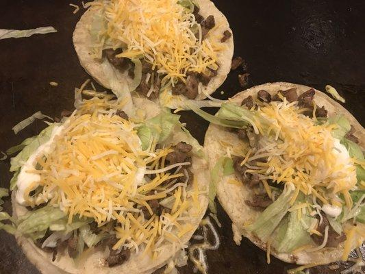 3 Steak Tacos with corn tortilla, lettuce, cream, and cheese