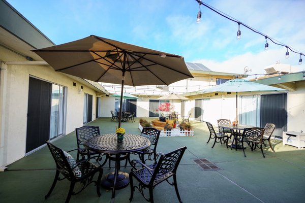 A photo of our spacious patio that is enjoyed often by our residents and family members to enjoy the weather and some fresh air!