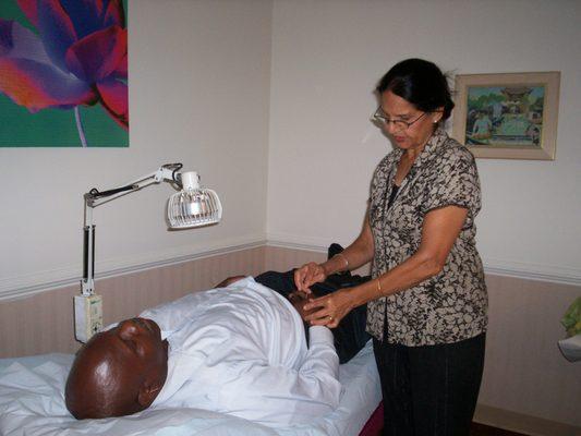 Acupuncture Session with Infrared Heat Treatment