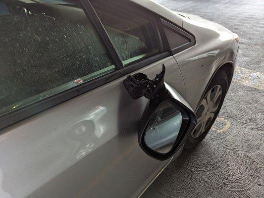 Broken passenger side mirror and side swipe - before picture.