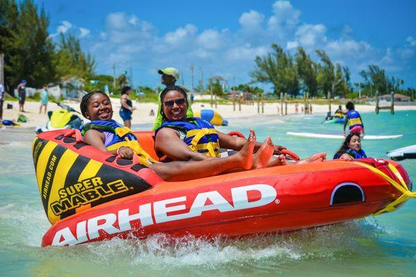 Family time with mother and daughter while on the Super Mable Airhead (Speed Zone) just before their wet and wild ride began.