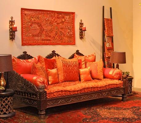 Triple arch Jhula daybed intricately hand carved in a traditional northern Indian style reminiscent of the swing benches found t